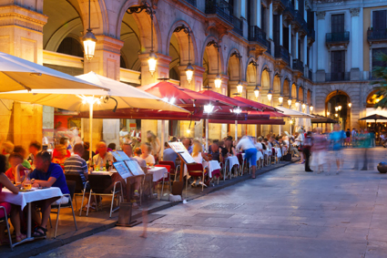 At sunset, gather with friends in the plaza for "un vaso de vino tinto"